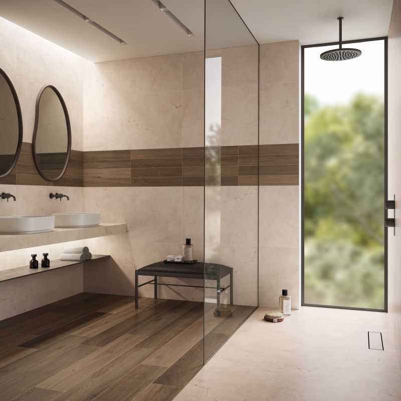 Gạch vân đá tone màu hồng nhạt phối với gạch giả gỗ tạo cảm giác ấm cúng cho nhà tắm