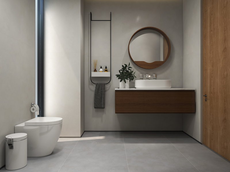 Gạch khổ lớn 750x1500mm màu xám tạo nên những mảng tường liền mạch, tăng thêm cảm giác sang trọng cho nhà vệ sinh