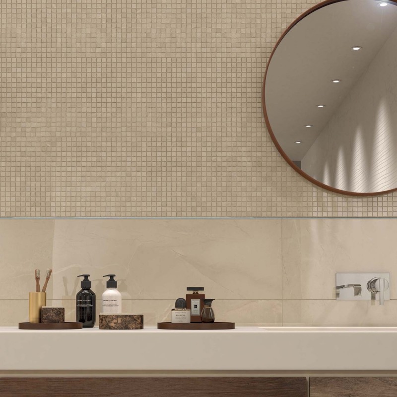 Gạch vân xi măng màu vàng kem kết hợp cùng gạch mosaic cùng tông, tạo nét đẹp sang trọng cho tường nhà vệ sinh