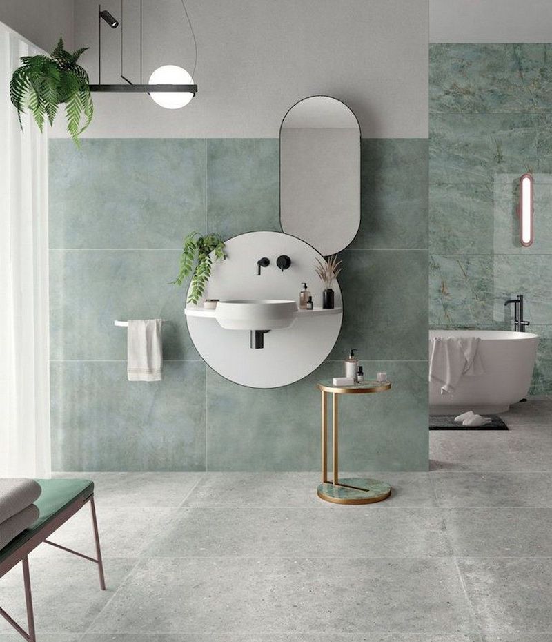 Gạch vân đá màu xanh ngọc với đường vân nhẹ nhàng, tạo cảm giác sang trọng cho nhà vệ sinh, nhà tắm